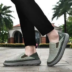 Detail shot of green men's breathable mesh loafers for summer casual walking wear