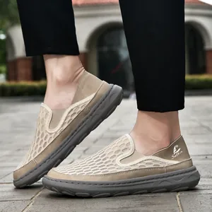 Close-up detail of men's breathable honeycomb mesh slip-on casual loafers in khaki