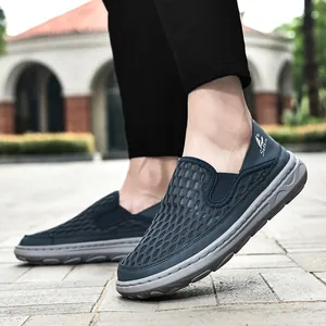 Close-up of breathable mesh upper on men's slip-on casual loafers with soft soles