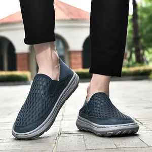 Close-up of men's navy blue breathable mesh slip-on loafers with soft soles