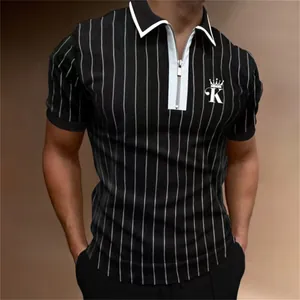 Macro view of men's black striped polo shirt with zipper collar and crown logo print