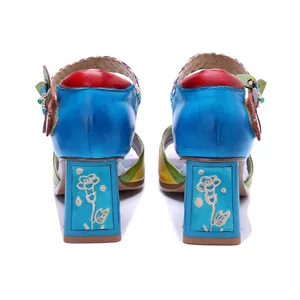 Rear view of colorful vintage handmade leather sandals featuring floral chunky heels