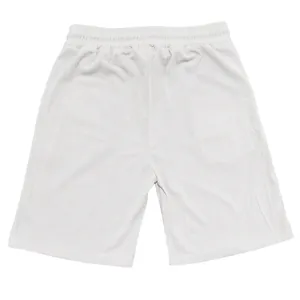 Primo piano dei pantaloncini da uomo in velluto a coste crema con fascia elastica in vita
