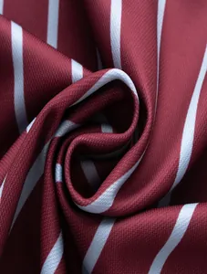 Macro detail of breathable burgundy and white striped fabric for men's polo shirt