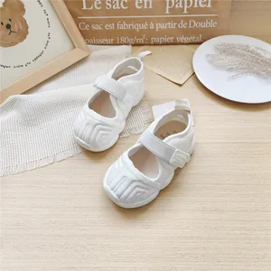 White mesh children's sports sandals with Velcro strap and thick protective sole.