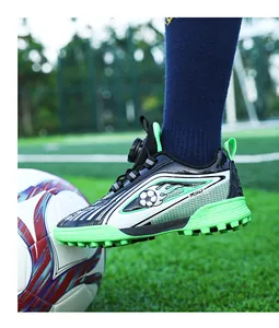 Scarpe da calcio professionali per bambini con fibbia rotante in nero e verde neon