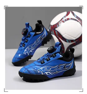 Detail view of blue children's soccer shoes featuring flame patterns and a dial lacing system.