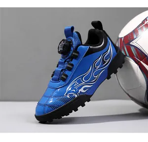 Blue kids soccer turf shoe featuring a convenient rotary dial buckle and flame patterns.