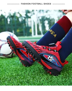 Scarpe da calcio professionali rosse per bambini con pratica chiusura a fibbia rotante