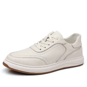 Side view of white pebbled leather sneakers for men featuring breathable lightweight soles