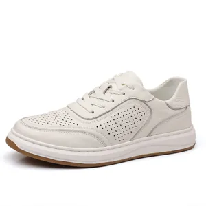 Close-up side view detail of white breathable cowhide leather men's casual fashion sneaker