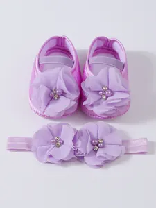 Chaussures de princesse violettes pour bébé et bandeau à fleurs assorti