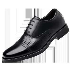 Detail of men's black leather Oxford shoes with brogue toe cap design
