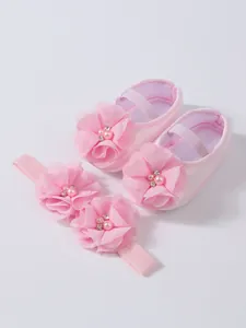 Chaussures de princesse roses à semelle souple avec bandeau floral assorti bébé
