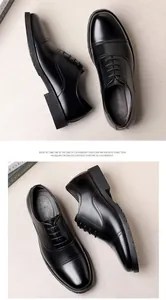 Detail view of premium black leather cap-toe dress shoes with lightweight EVA foam soles