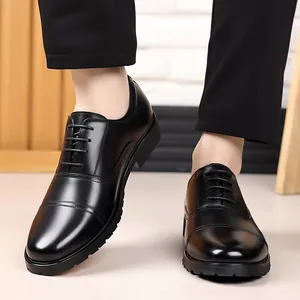 Classic black men's leather oxfords for formal business attire and professional work.