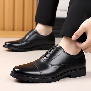 Detailed side view of black leather cap-toe Oxford shoes for men's formal business wear