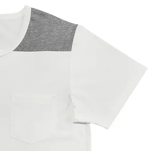 Detail view of men's white Henley t-shirt showing grey shoulder panel and chest pocket