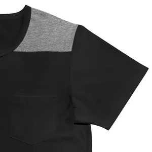 Close-up detail of men's short-sleeve color-block shirt showing shoulder seams and pocket