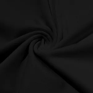 Macro detail showing the soft black breathable knitted fabric texture for a men's Henley shirt.