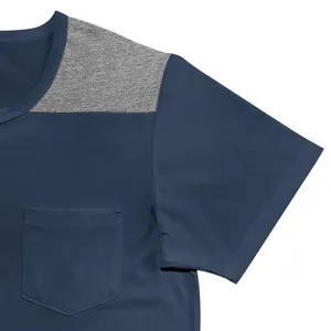 Close-up of men's navy blue t-shirt detailing the heather grey shoulder panel and chest pocket