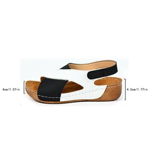 Detailed side view of women's black and white wedge platform sandals with 4.5cm heel height