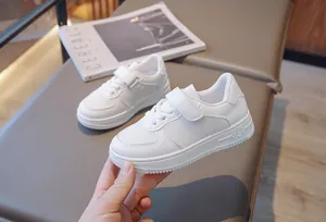 Classic white children's breathable mesh sneakers with convenient hook and loop strap