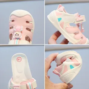 Toddler pink closed-toe sandals with soft flexible sole and bear detail