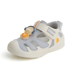 Breathable baby walking sandals with closed-toe design and cute cartoon character.