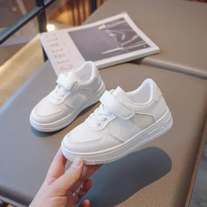 Stylish breathable white mesh children's sneakers with comfortable velcro strap closure