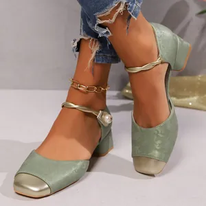Sage green floral Mary Jane shoes with pearl strap and gold toe cap, chunky low heel design.