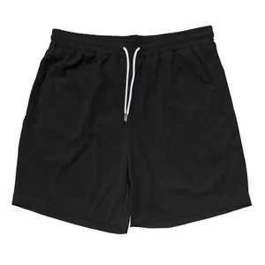 Primo piano dettagliato che mostra la trama in velluto a coste nero e il cordoncino di questi shorts