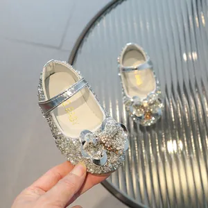 Chaussures de soirée argentées pour filles avec strass brillants et un grand nœud décoratif