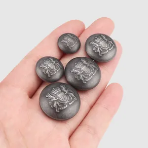Vintage style embossed brass buttons with royal crest design in five different sizes