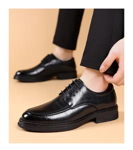 Detailed side view of classic black men's business dress shoes in premium leather