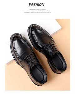 Top-down detailed view of elegant black leather men's business casual wedding shoes