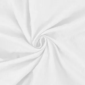Close-up macro detail of white breathable cotton linen fabric texture for summer shirts