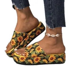 Trendy summer women's platform slides featuring a vibrant sunflower print design