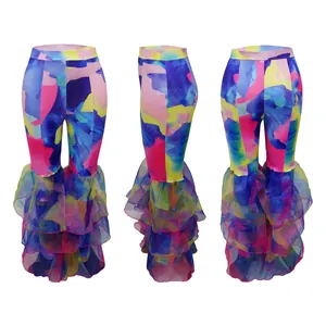 Πολύχρωμο παντελόνι tie-dye με βολάν σε στρώσεις, που φαίνεται από τρεις γωνίες