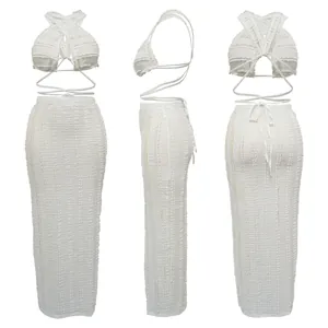 Full 360-degree detail of white lace two-piece set with backless top and maxi skirt