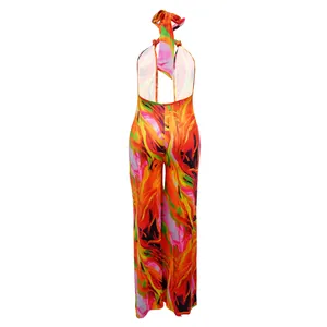 Detailed back view of a vibrant floral halter neck backless wide-leg jumpsuit