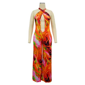 Full view of women's floral print halter jumpsuit with front cut-out on mannequin.