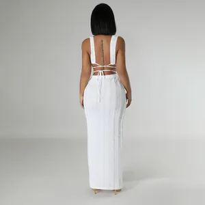 Elegant white two-piece lace-up backless long skirt set featuring textured fabric