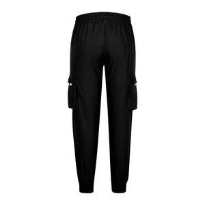 Rear view of black loose-fit men's cargo joggers with multiple utility pockets and elastic cuffs