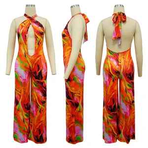 Front side and back views of a vibrant floral print halter neck backless jumpsuit