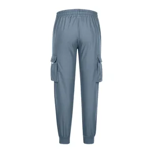 Back view of blue men's cargo jogger pants with elastic waist and side pockets