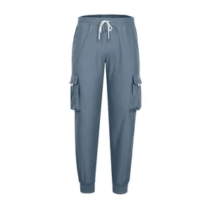 Detailed view of premium blue men's cargo pants with multi-pockets and drawstring