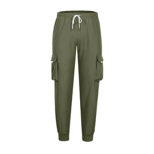 Detailed view of olive green cargo joggers featuring drawstring waist and large pockets.