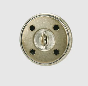 Detailed rear view of an antique brass metal button with central shank and four holes