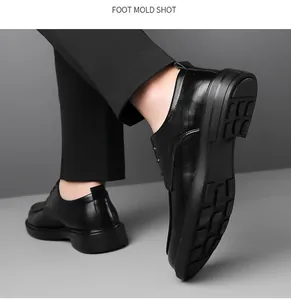 Detail view of men's black business formal leather shoes with soft sole